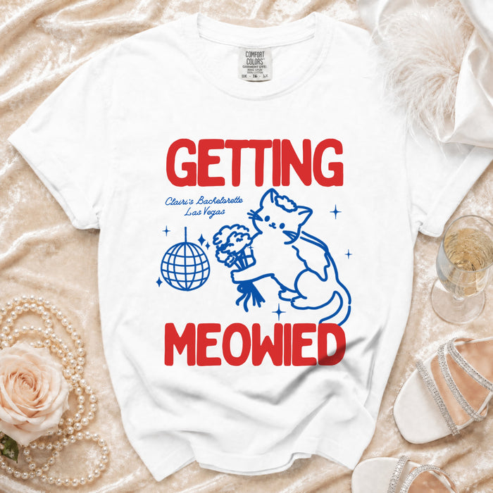 White t-shirt with "GETTING MEOWIED" text, a cat, disco ball, and bachelorette details.