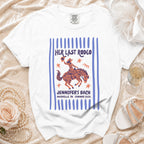 White t-shirt with "Her Last Rodeo" graphic, a cowgirl on a horse.