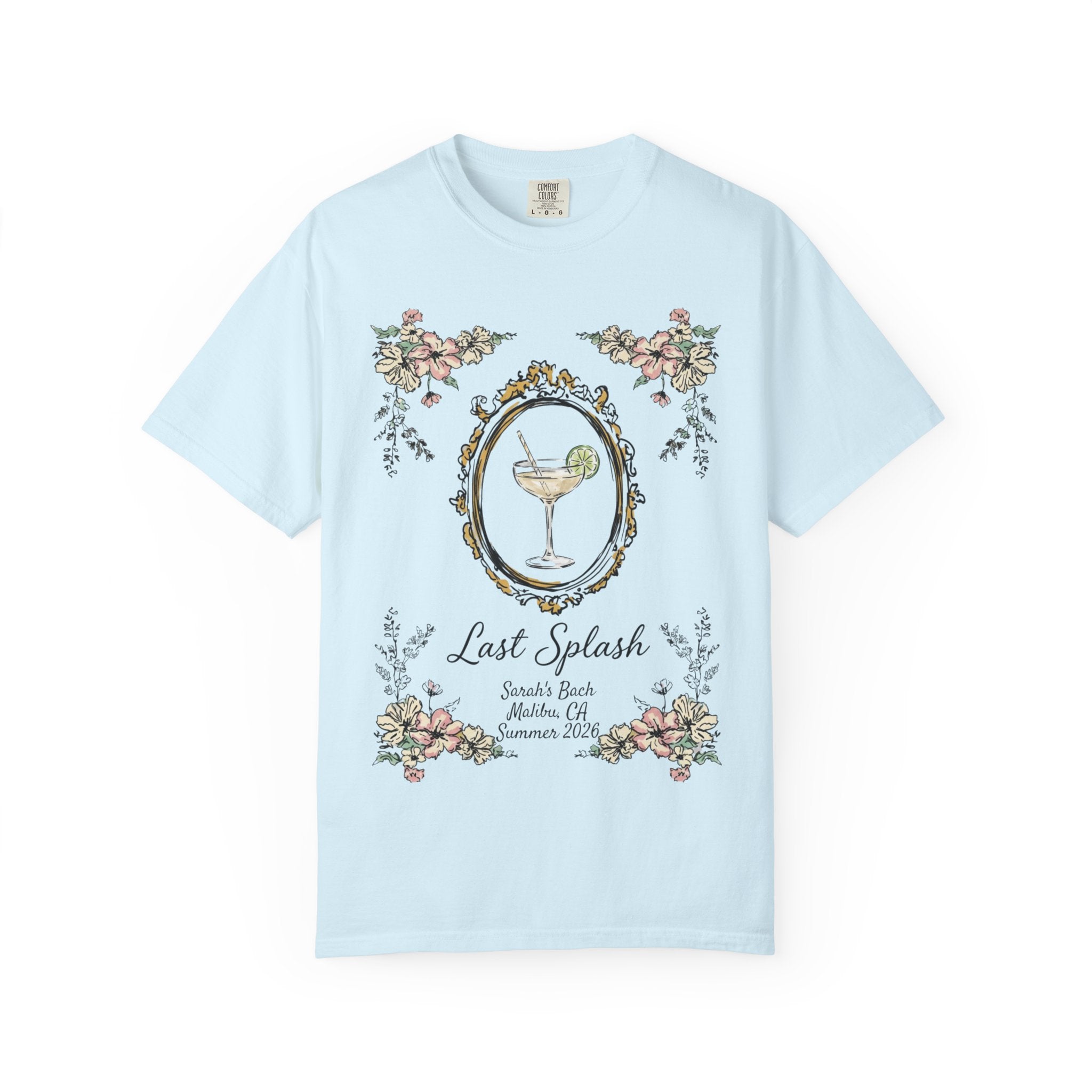 Light blue t-shirt with a cocktail and floral border, reading "Last Splash" and event details.
