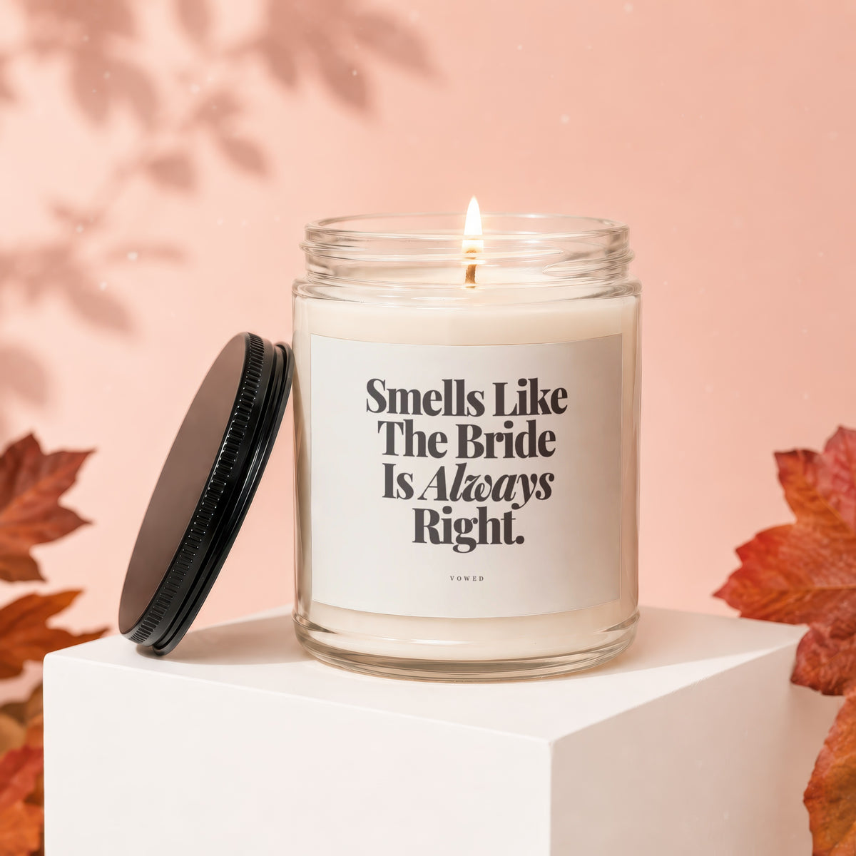 Glass jar candle with "Smells Like The Bride Is Always Right." text.