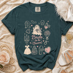 Teal t-shirt with "Bride to be (Beware)" and spooky wedding graphics.