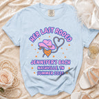 Light blue t-shirt with "Her Last Rodeo Jennifer's Bach Nashville, TN Summer 2026" text.