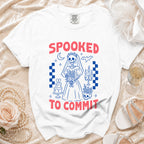 White t-shirt with "Spooked to Commit" text and skeleton bride graphic.