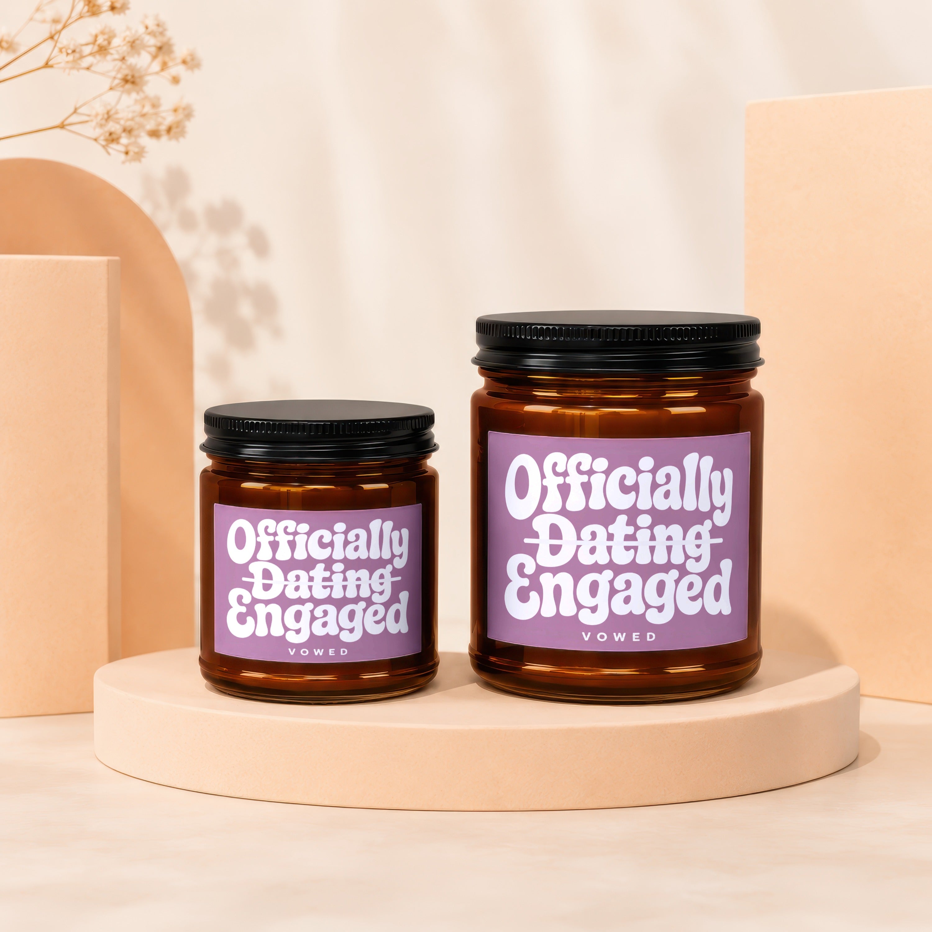 Two candles labeled "Officially Dating Engaged" are displayed on pedestals.