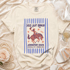 Cream t-shirt with "Her Last Rodeo" and cowboy on horse graphic, Nashville bachelorette.
