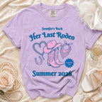 Purple t-shirt with "Her Last Rodeo" and western graphics for Summer 2026.