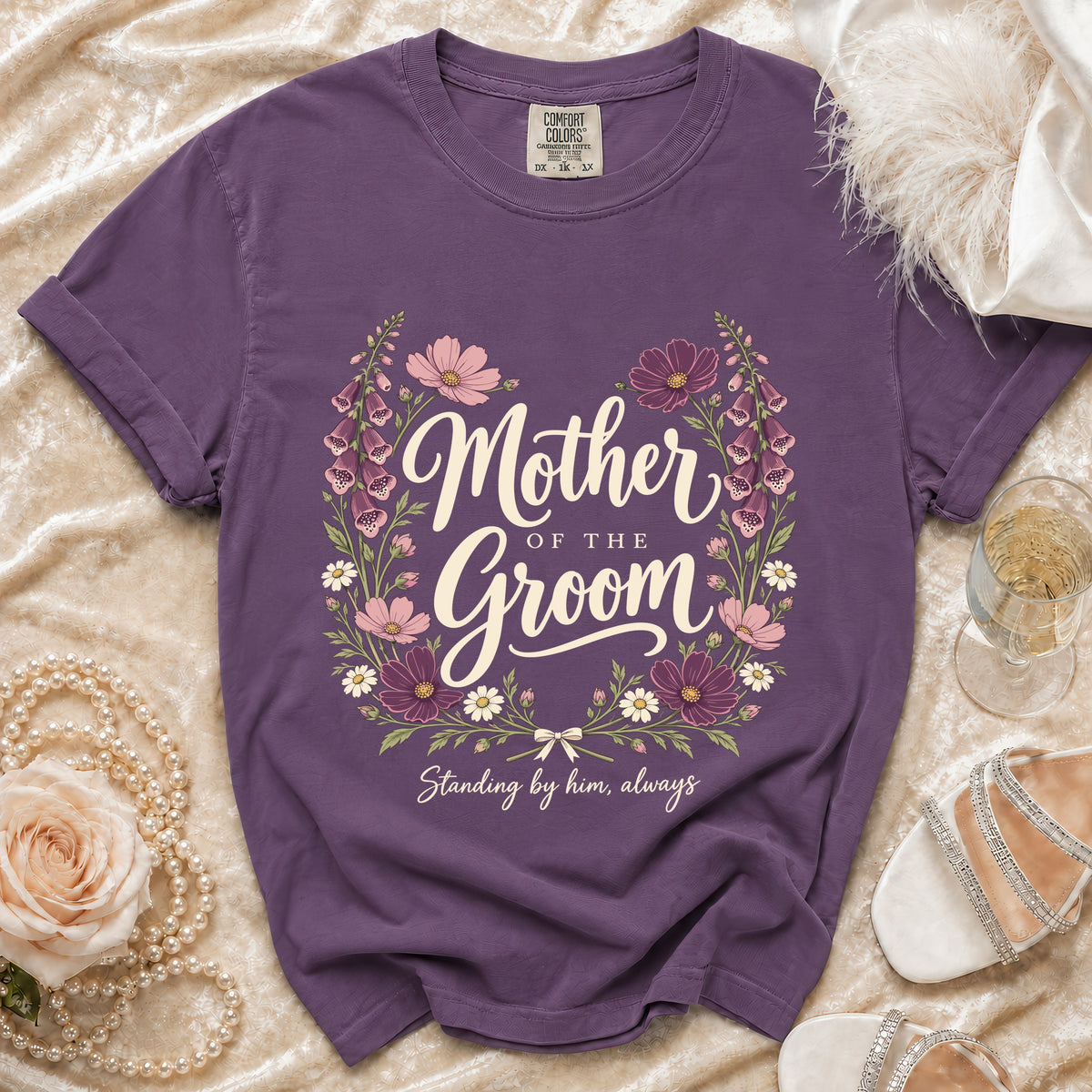 Purple t-shirt with "Mother of the Groom" and "Standing by him, always" text.