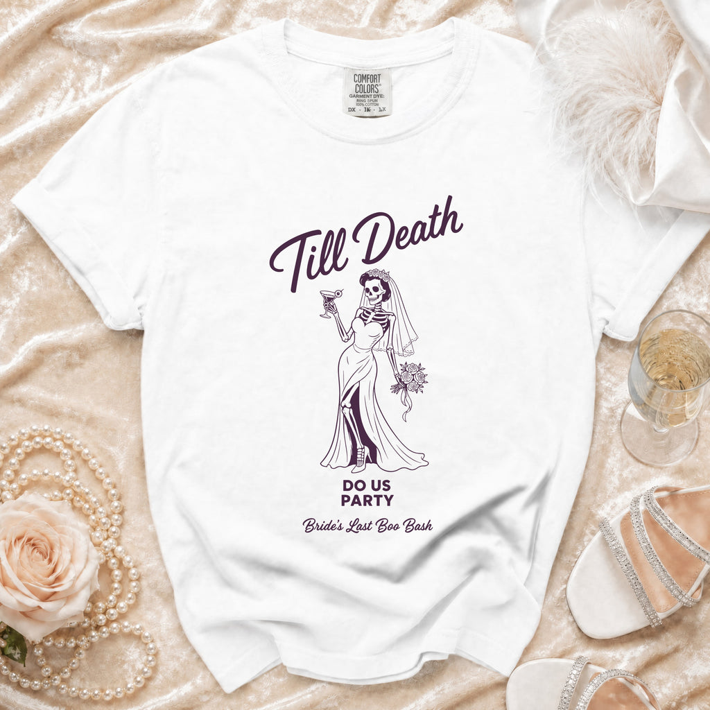 White t-shirt with skeleton bride graphic reading "Till Death" and "Bride's Last Boo Bash."
