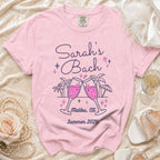 Pink t-shirt with "Sarah's Bach Malibu, Ca Summer 2026" text and celebratory graphics.
