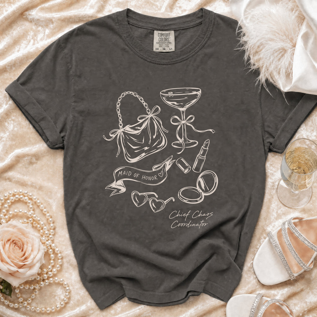 Charcoal Comfort Colors t-shirt with "Maid of Honor" and "Chief Chaos Coordinator" text and icons.