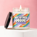 Glass candle with colorful retro stripes on the label, reading "My Other Mom!".