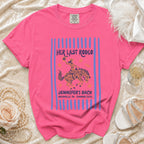 Pink t-shirt with "Her Last Rodeo" text and rodeo graphics.