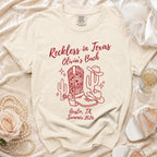 T-shirt with "Reckless in Texas Olivia's Bach Austin, TX Summer 2026" and Western graphics.