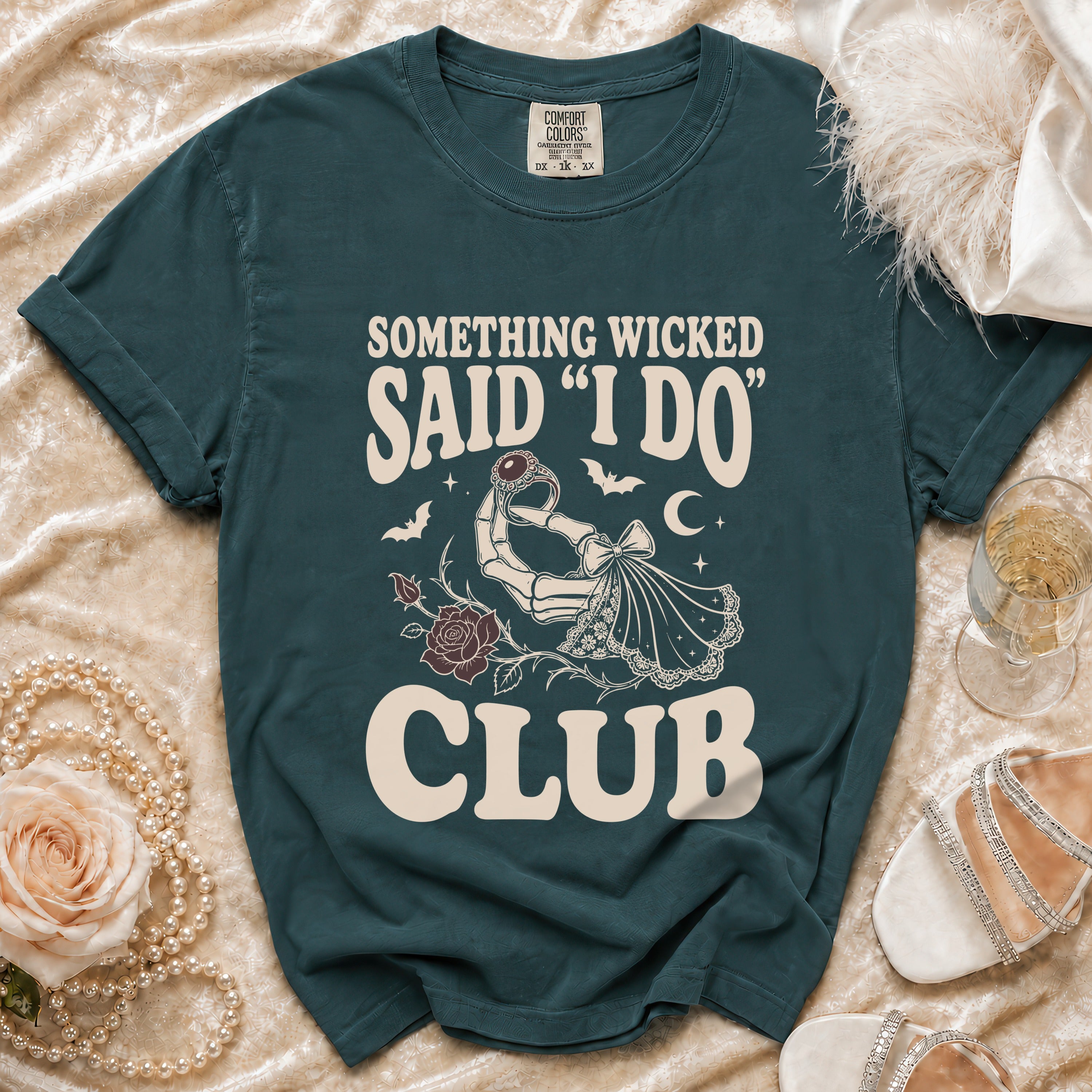 Teal t-shirt with "Something Wicked Said I Do Club" gothic graphic.