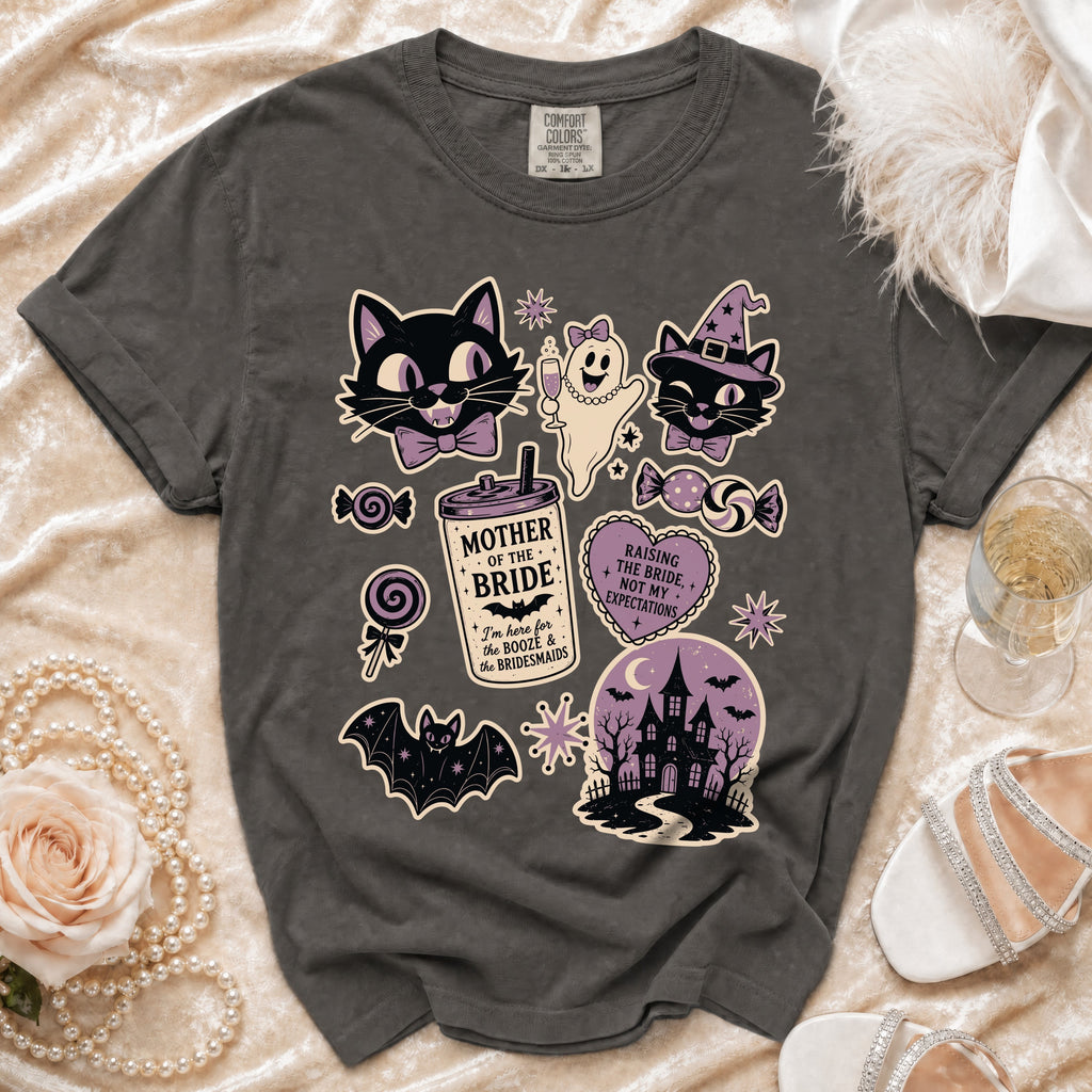 Dark gray t-shirt with Halloween bachelorette graphics including cats, a ghost, a castle, and text.