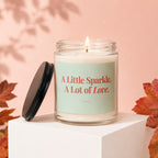 Glass jar candle with "A Little Sparkle, A Lot of Love." text.