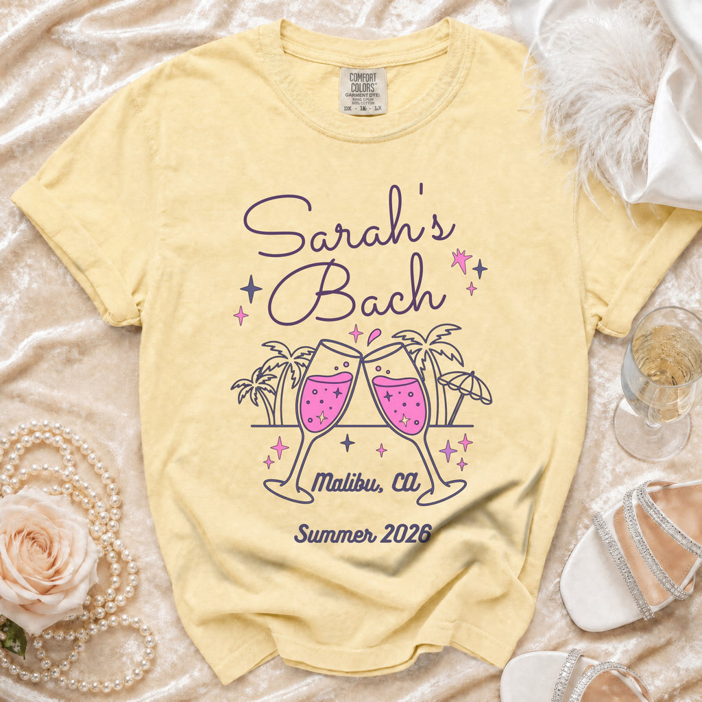 Yellow t-shirt with "Sarah's Bach Malibu, Ca Summer 2026" design.