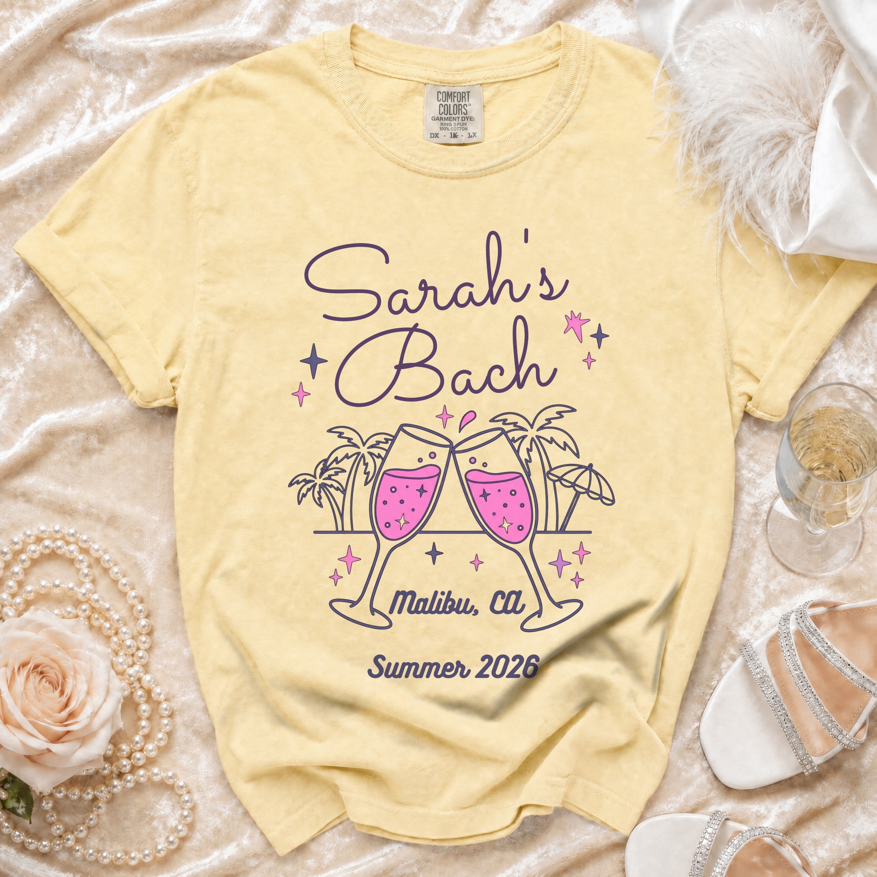 Yellow t-shirt with "Sarah's Bach Malibu, Ca Summer 2026" design.