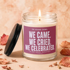 Candle with a lit wick and text: "The record shows: We came. We cried. We celebrated. In that order, repeatedly. Vowed."