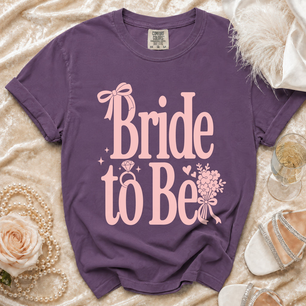 Purple t-shirt with "Bride to Be" and a diamond ring graphic.