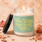 Lit candle in glass jar with lid beside it, featuring text "Two brides, one great story".