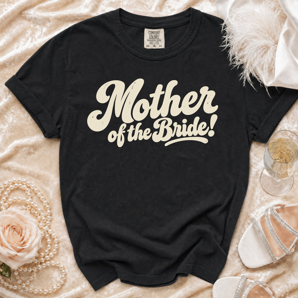 Black t-shirt with "Mother of the Bride!" text in cream.