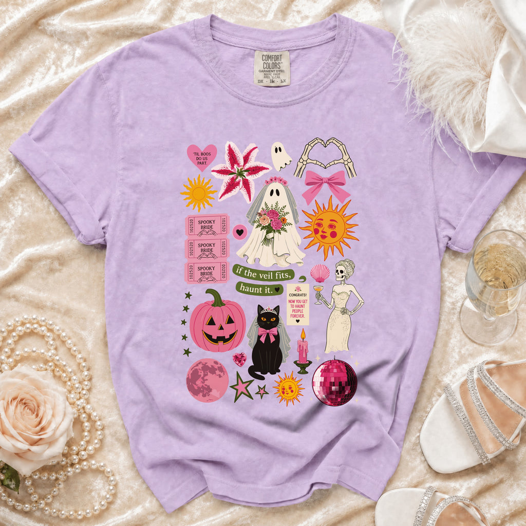 Purple Comfort Colors t-shirt with spooky bride, black cat, and Halloween graphics.