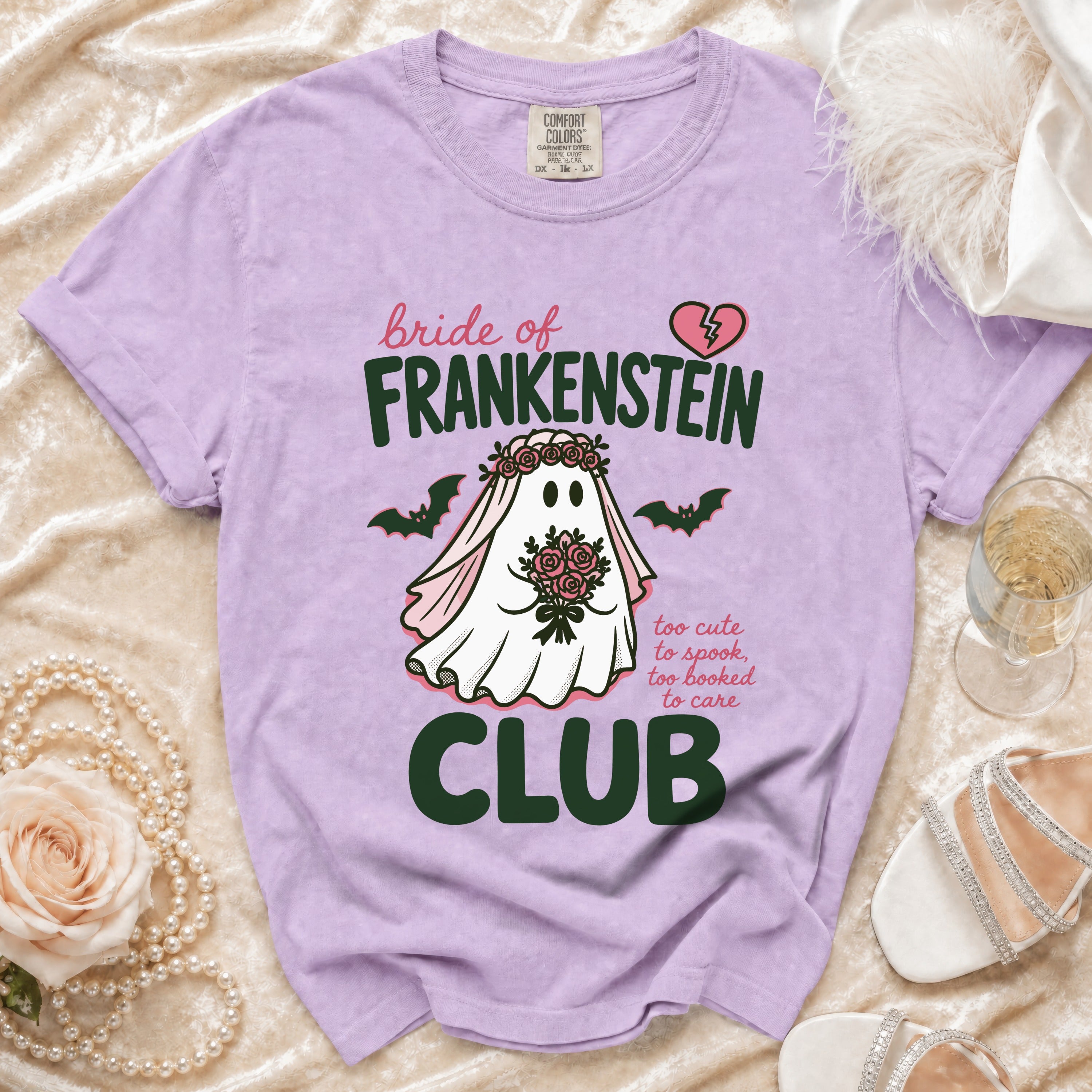 Purple t-shirt with "Bride of Frankenstein Club" graphic and a ghost bride.