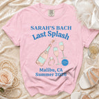 Pink t-shirt with "Sarah's Bach Last Splash" and champagne graphic.