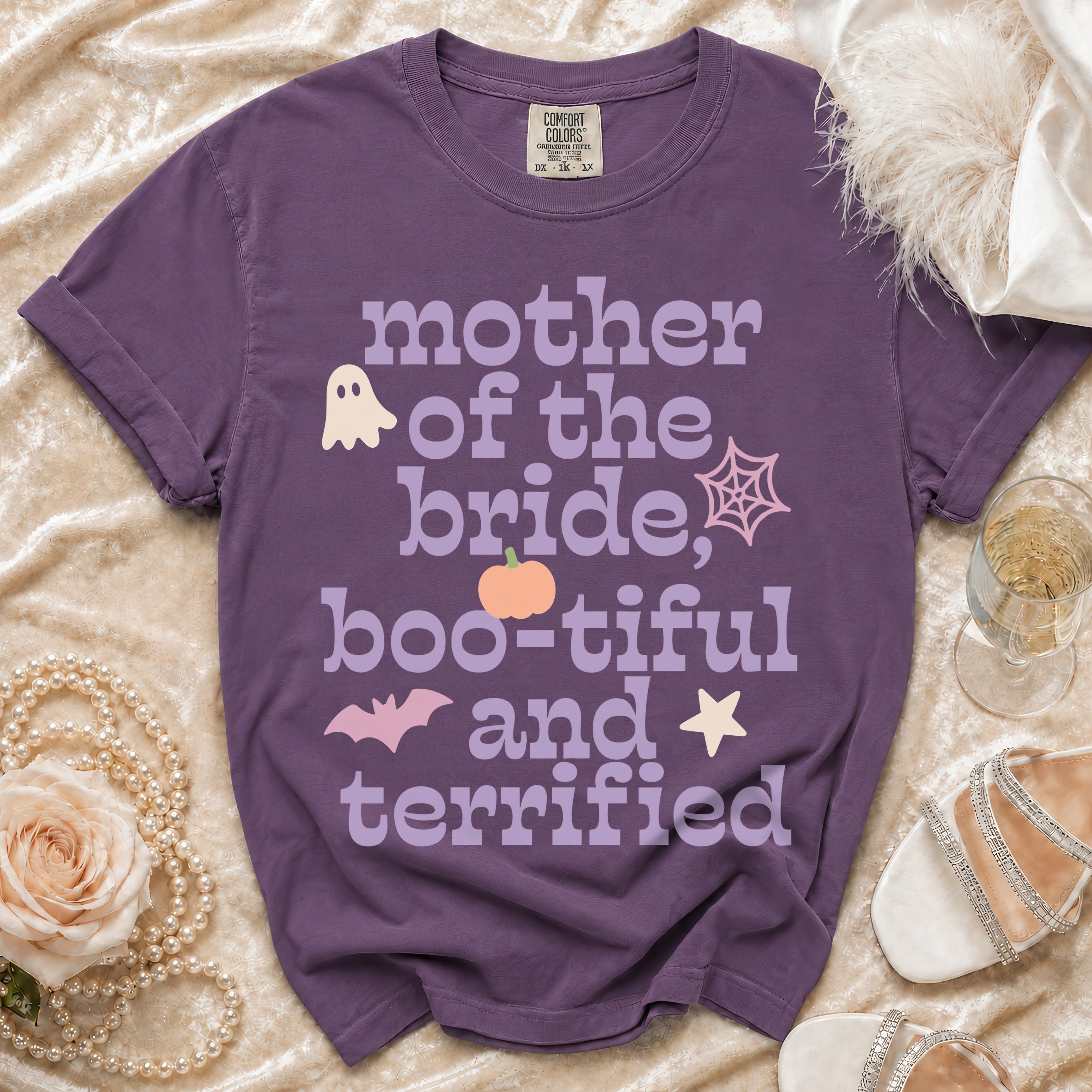 Purple t-shirt with "Mother of the Bride, Boo-tiful and Terrified" text and Halloween graphics.