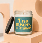 Glass candle with green label reading "Two misters, no missus" and "VOWED".