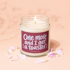 Glass jar candle with label reading "One more and I get a toaster."
