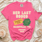 Pink t-shirt with "Her Last Rodeo Jennifer's Bath Nashville, TN Summer 2026" text and cowboy boots.