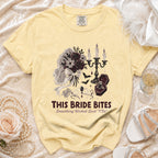 Yellow t-shirt with "This Bride Bites" and gothic bridal graphics.