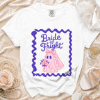 White t-shirt with "Bride of Fright" text and a pink ghost bride graphic.