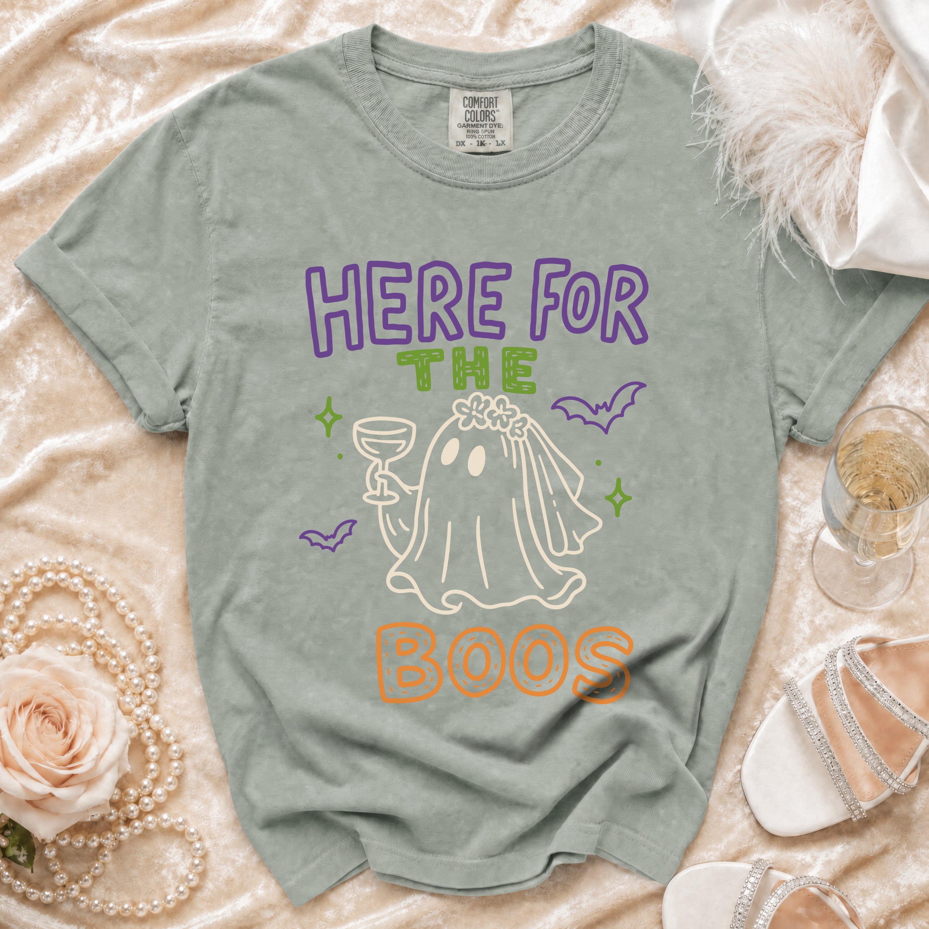 Green t-shirt with "HERE FOR THE BOOS" text and ghost bride graphic.