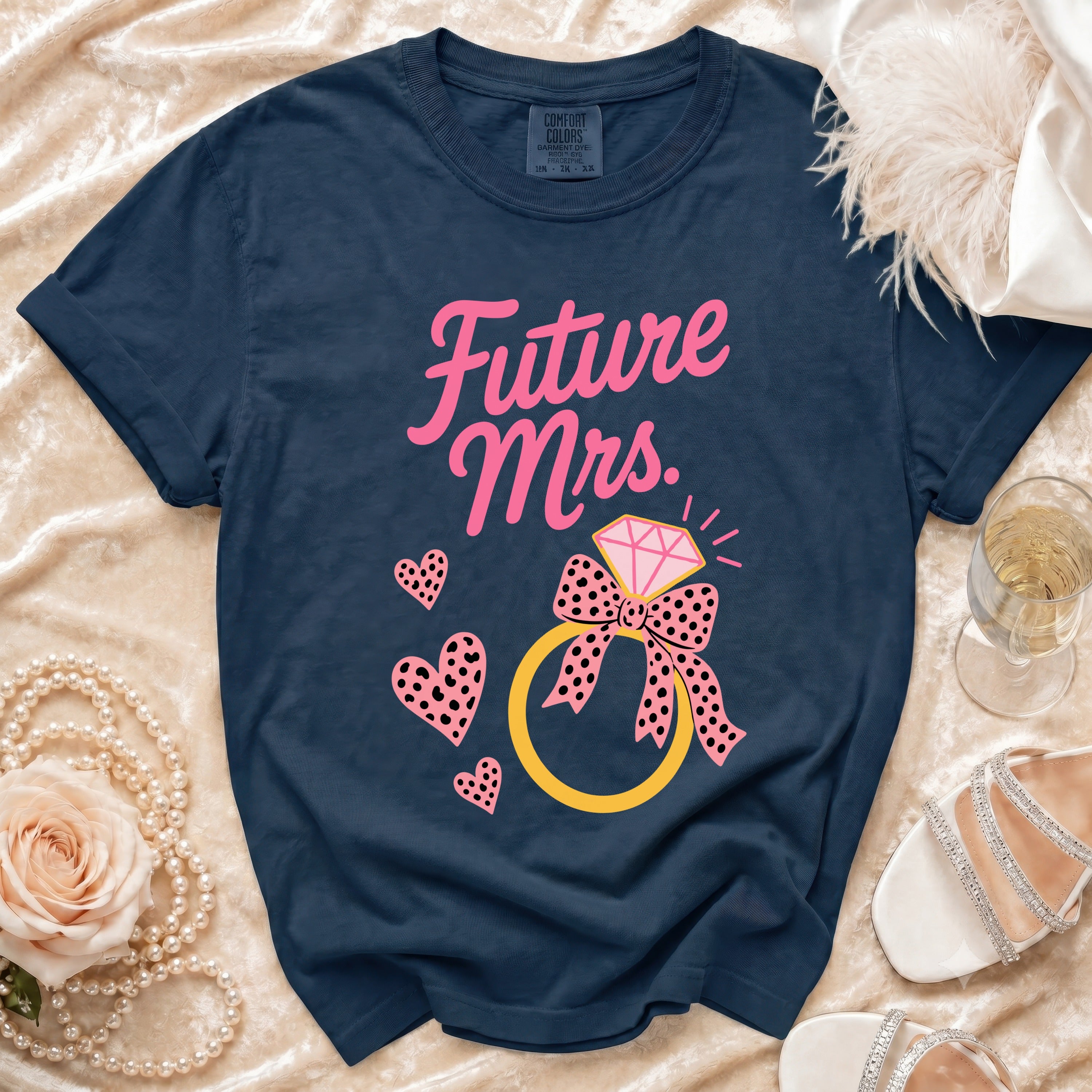 Navy t-shirt with "Future Mrs." text, ring, and hearts graphic.