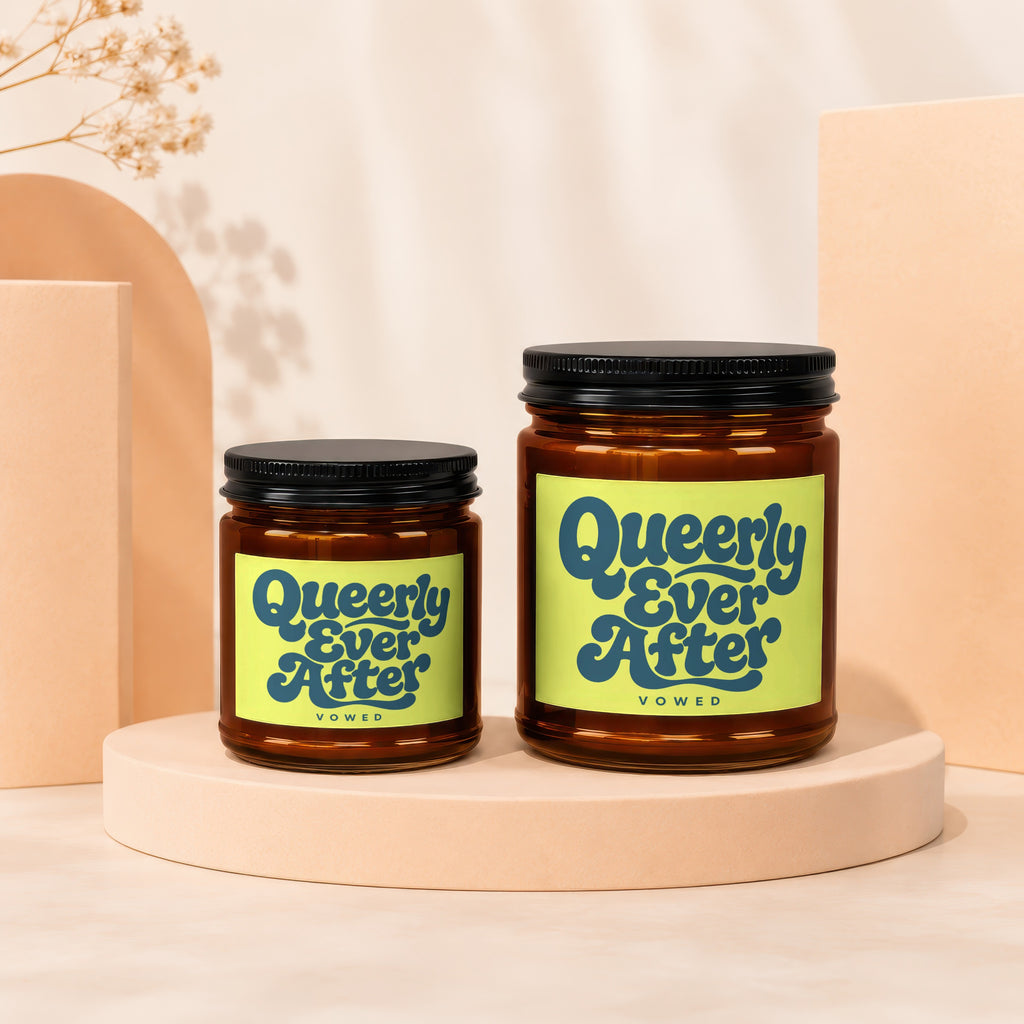 Two glass jars with black lids and lime green labels reading "Queerly Ever After."