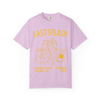 "Last Splash" text with champagne glasses, pool floats, and a champagne bottle on a pink t-shirt.