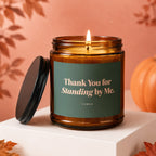 Amber candle with "Thank You for Standing by Me. VOWED" text.