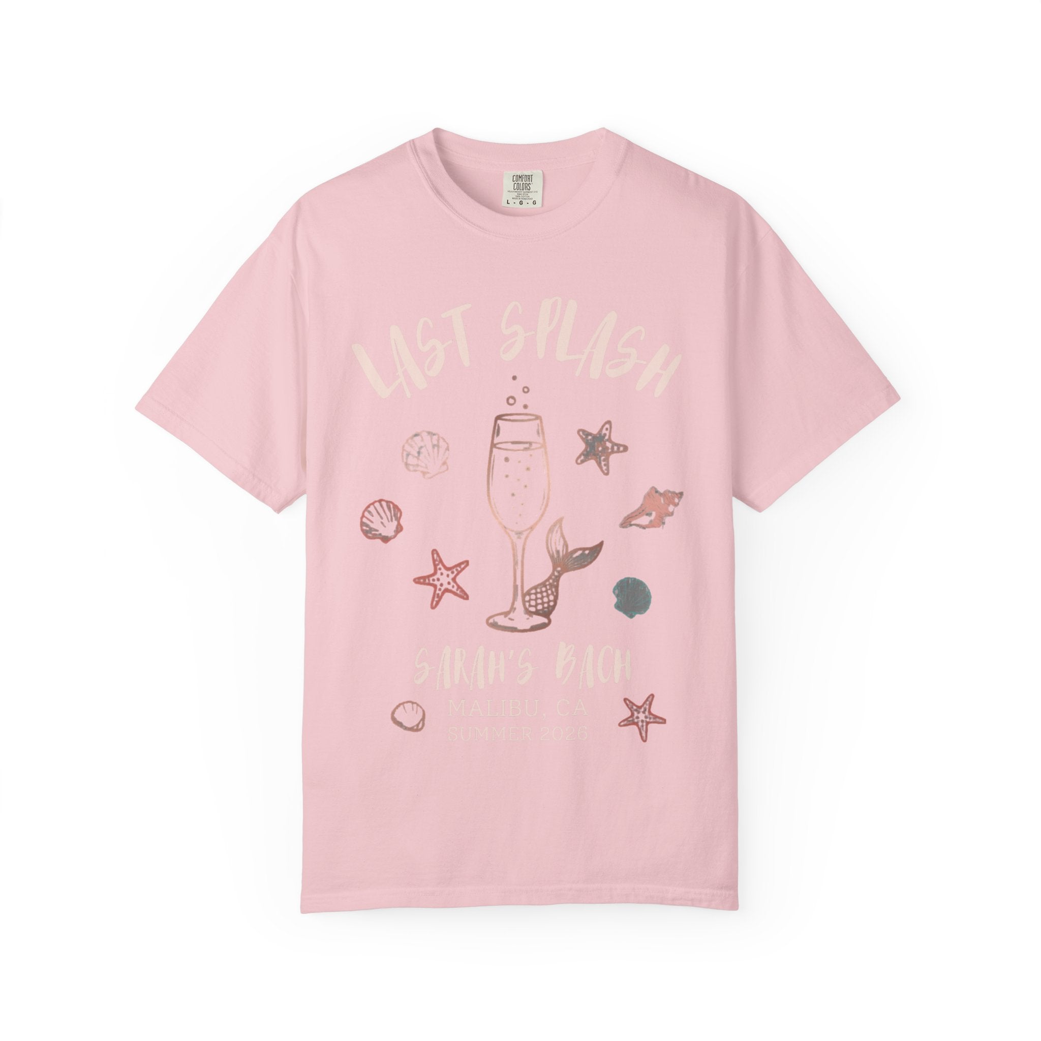 Pink t-shirt with "Last Splash Sarah's Bach Malibu CA Summer 2026" and seashell graphic.