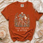 Orange t-shirt with skeletons dancing and text "TILL DEATH & AFTER".
