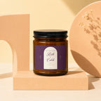 Anniversary candle with text "Ruth + Caleb" and date "11 | 03 | 09".