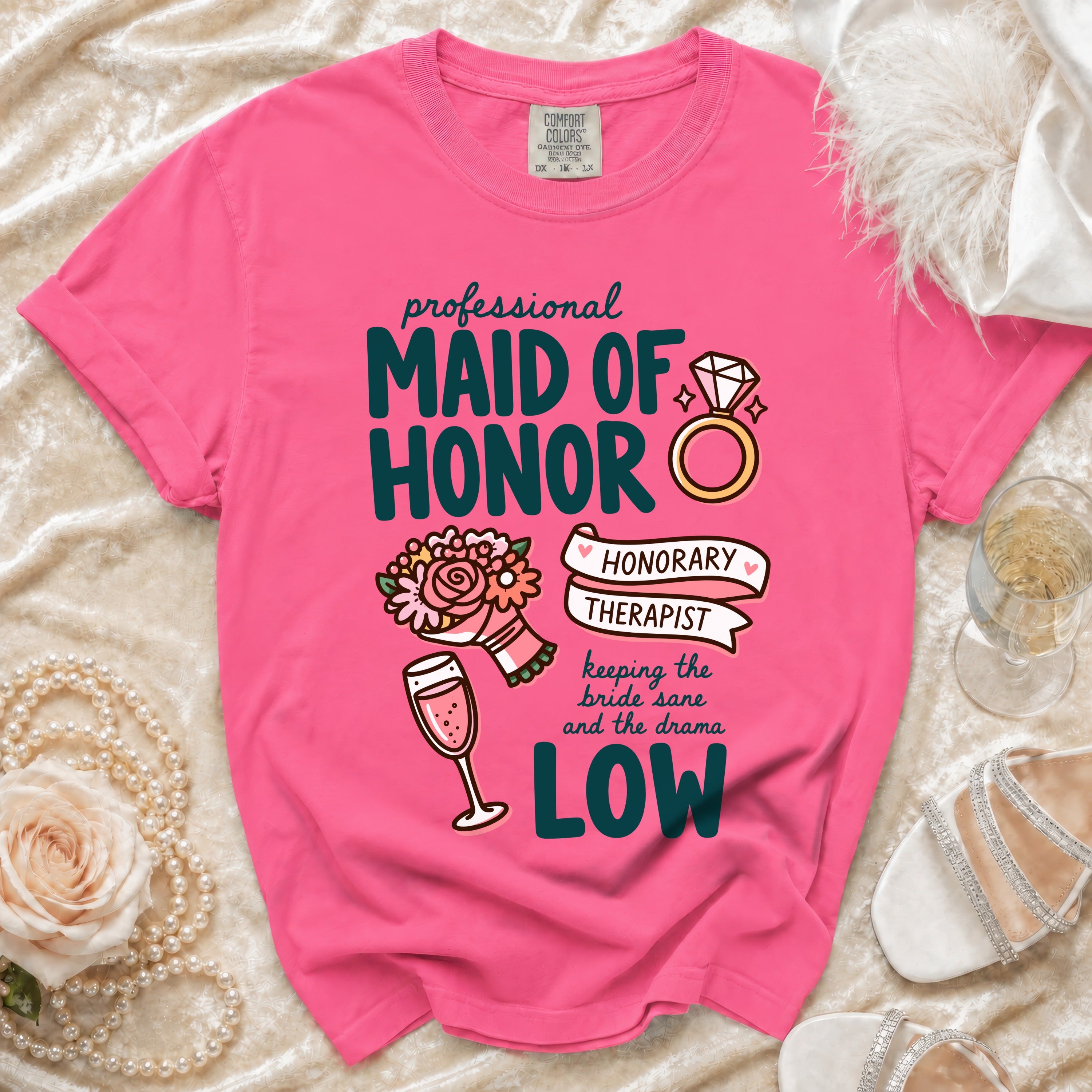 Pink t-shirt with "MAID OF HONOR" and "HONORARY THERAPIST" graphic.