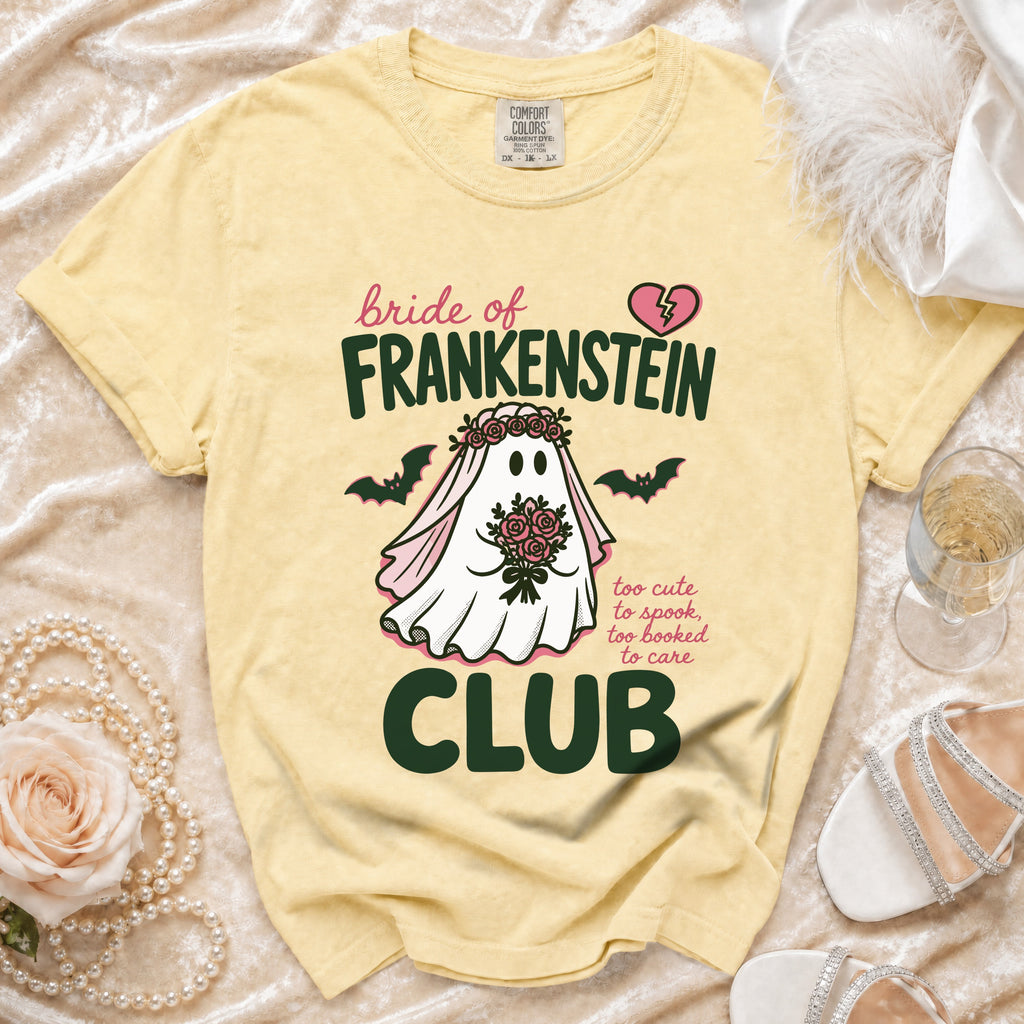 Yellow t-shirt with bride of Frankenstein ghost graphic and text: "CLUB".
