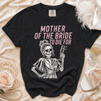Black t-shirt with "MOTHER OF THE BRIDE TO DIE FOR" and skeleton graphic.