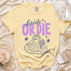 Yellow t-shirt with "bride OR DIE" text and ghost bride graphic.