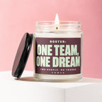 Glass jar candle with black lid and label reading, "ROSTER: ONE TEAM, ONE DREAM".