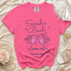 Bright pink t-shirt for Sarah's Bach in Malibu, CA, Summer 2026.