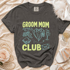 Dark grey t-shirt with "GROOM MOM CLUB" text and wedding icons.